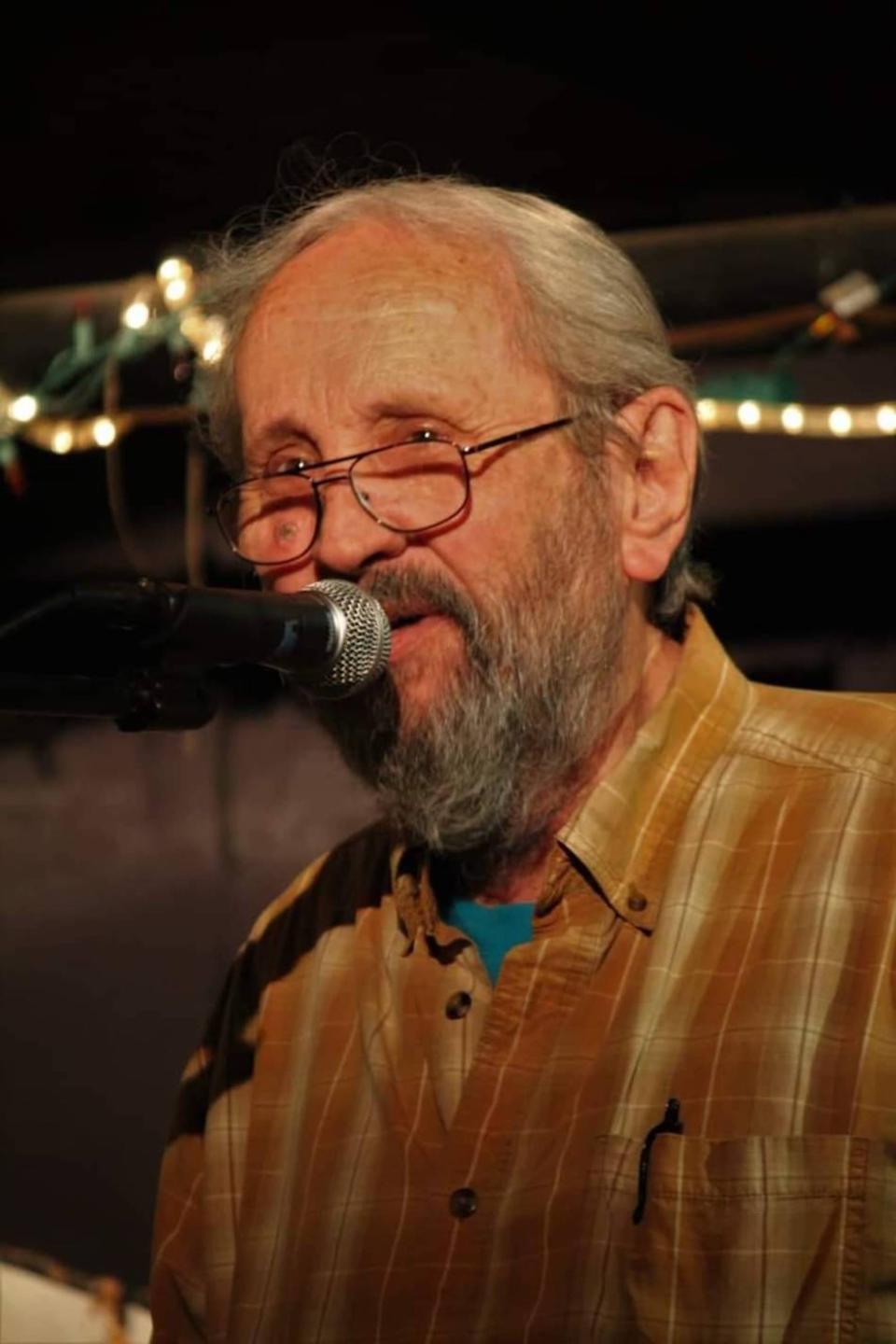 McCaffrey recites Irish poems and drinking songs at the Blue Tavern.