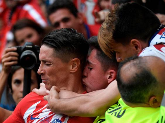 Torres celebrates scoring for Atletico in his final game for the club (Getty Images)