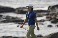 Andrew Putnam walks to the ninth green of the Pebble Beach Golf Links during the third round of the AT&T Pebble Beach Pro-Am golf tournament in Pebble Beach, Calif., Saturday, Feb. 5, 2022. (AP Photo/Eric Risberg)