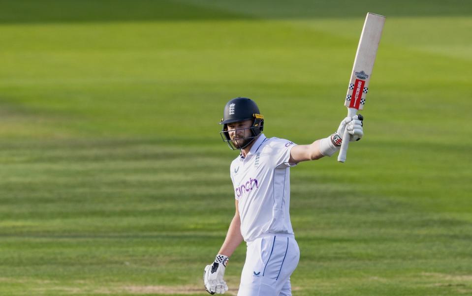 Gus Atkinson acknowledges the applause for his maiden Test fifty.