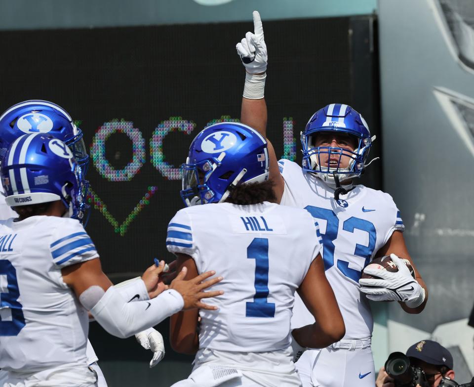 BYU tight end Isaac Rex (83) celebrates his touchdown against he Oregon Ducks at Autzen Stadium in Eugene, Sept. 17, 2022.