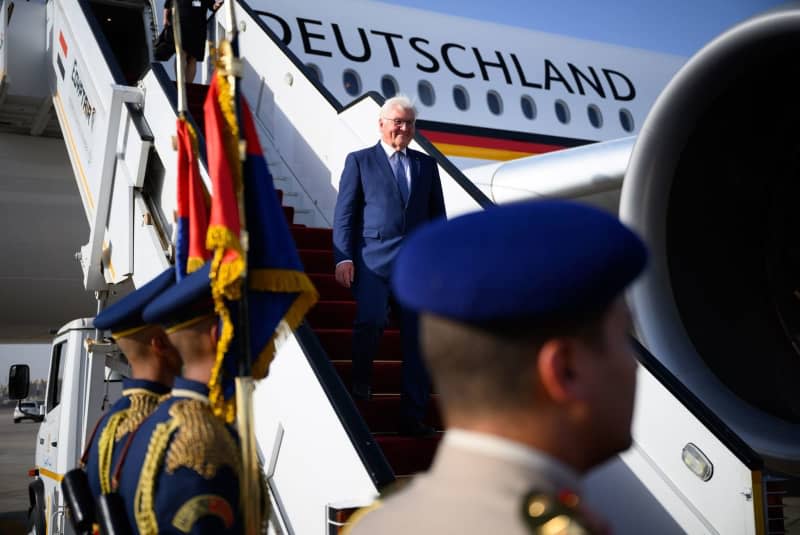 German President Frank-Walter Steinmeier steps out of an Airbus A350 aircraft of the Bundeswehr Air Wing at Cairo International Airport. Bernd von Jutrczenka/dpa