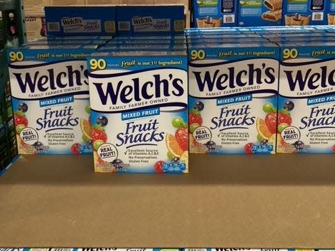 boxes of welch's fruit snacks on the shelves at cotsco