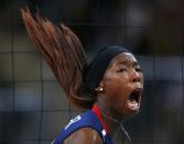 Destinee Hooker of the U.S. celebrates a point against Brazil during their women's gold medal volleyball match at Earls Court during the London 2012 Olympic Games August 11, 2012. REUTERS/Ivan Alvarado (BRITAIN - Tags: OLYMPICS SPORT VOLLEYBALL TPX IMAGES OF THE DAY) 