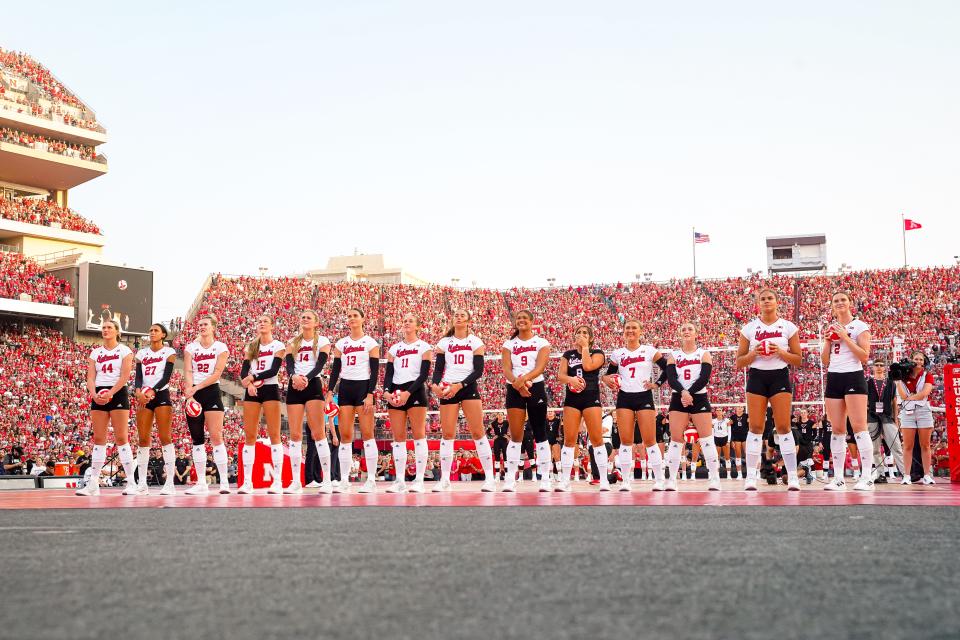 The Nebraska Cornhuskers watch a presentation before the match against the Omaha Mavericks at Memorial Stadium.