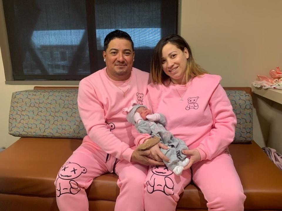 Yanitza Heredia Natal and Rodolfo Bol Argon holding their baby, Skylynn Bol Heredia.