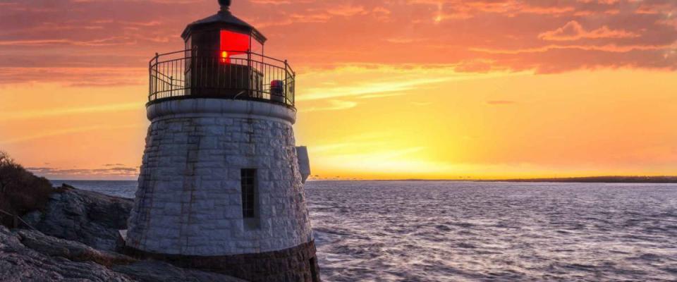 Castle Hill Lighthouse in orange sunset