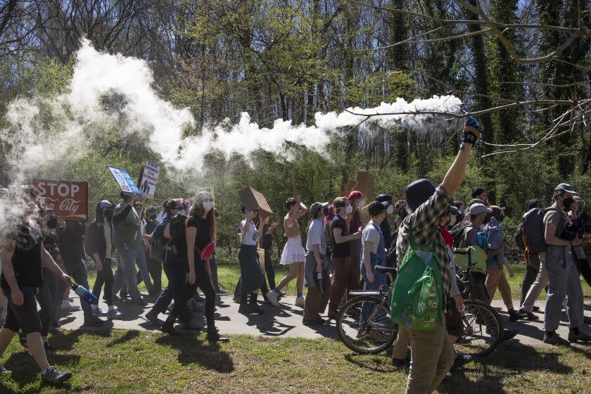 ATLANTA, GEORGIA - MARCH 4: Environmental activists hold a rally and a march through the Atlanta Forest, a preserved forest Atlanta that is scheduled to be developed as a police training center, March 4, 2023 in Atlanta, Georgia. Intent upon stopping the building of what they have called cop city, the environmentalists were evicted from the forest in January, resulting in the killing by police of Manuel Teran, a young activist and medic. (Photo by Andrew Lichtenstein/Corbis via Getty Images)