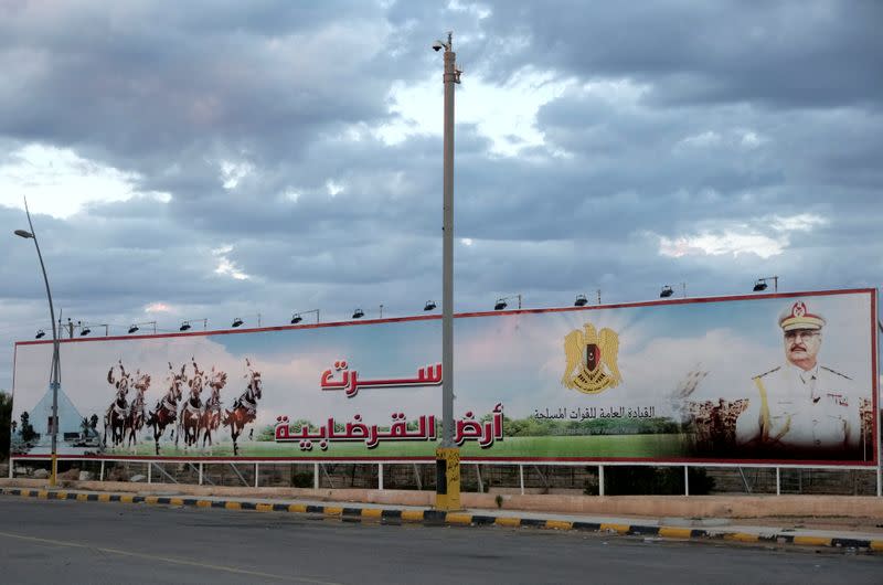 A poster of the Libyan military commander Khalifa Haftar is seen at the entrance to the city in Sirte