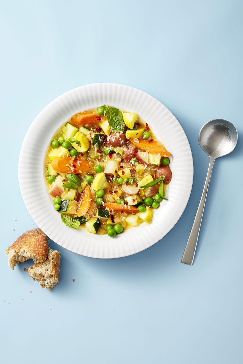 summer minestrone with zucchini, carrots and peas