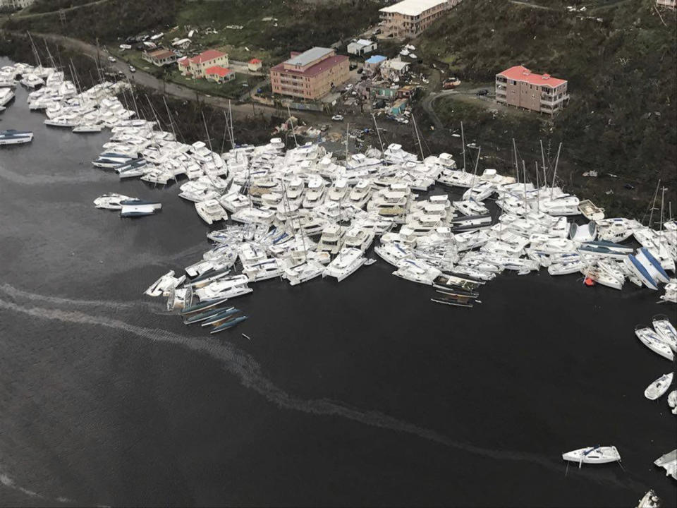 <p>Boats are clustered together after Hurricane Irma Friday, Sept. 8, 2017. The death toll from Hurricane Irma has risen to 22 as the storm continues its destructive path through the Caribbean. The dead include 11 on St. Martin and St. Barts, four in the U.S. Virgin Islands and four in the British Virgin Islands. There was also one each in Barbuda, Anguilla, and Barbados. The toll is expected to rise as rescuers reach some of the hardest-hit areas. (Photo: Caribbean Buzz via AP) </p>
