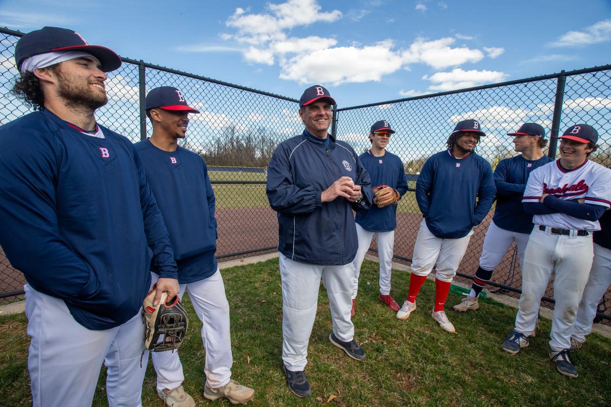 Brookdale head coach Johnny Johnson talks with his team before the Rowan College of South Jersey - Cumberland vs. Brookdale baseball game at Brookdale Community College in Lincroft, NJ Monday, March 18, 2024.