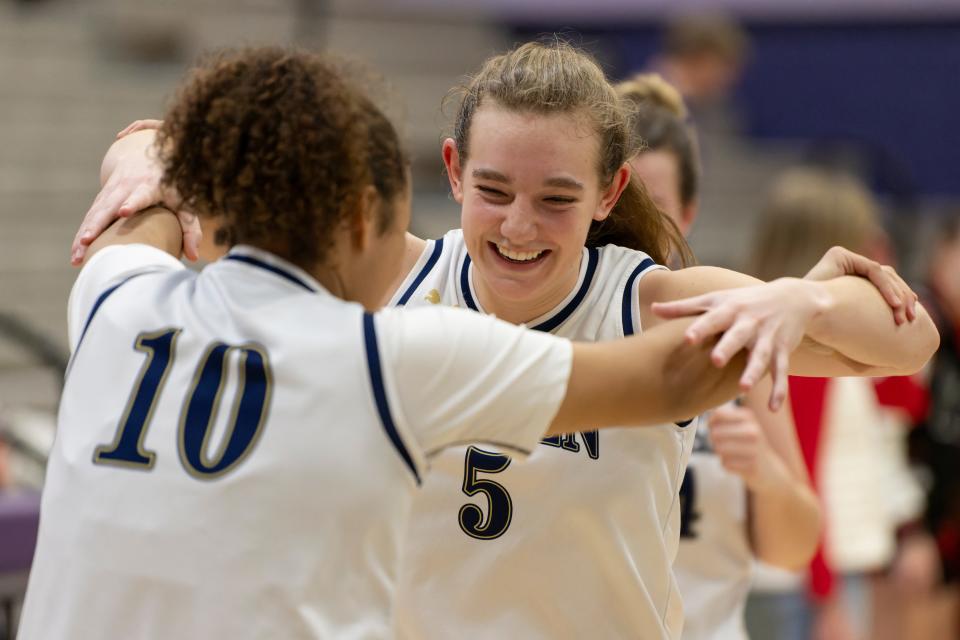 Hayden's Lauren Sandstrom (5) celebrates with Millie Ramsey (10) after the game March. 2, 2024 at Jefferson West High School.