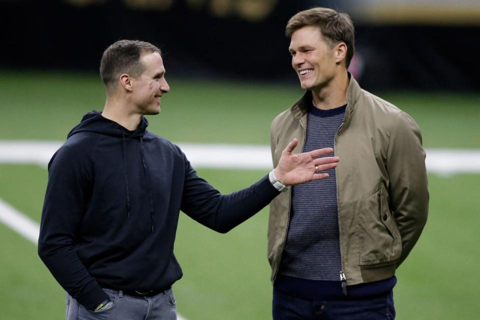 Mandatory Credit: Photo by Butch Dill/AP/Shutterstock (11713996bn) New Orleans Saints quarterback Drew Brees left, speaks with Tampa Bay Buccaneers quarterback Tom Brady after an NFL divisional round playoff football game between the New Orleans Saints and the Tampa Bay Buccaneers, in New Orleans. The Tampa Bay Buccaneers won 30-20 Buccaneers Saints Football, New Orleans, United States - 17 Jan 2021
