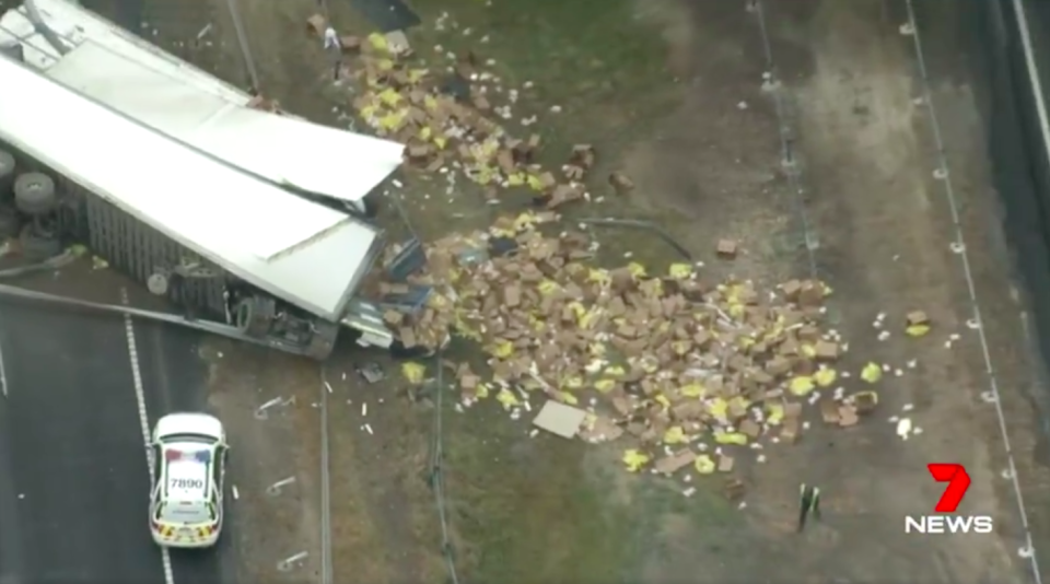 The truck’s cargo of frozen chicken was strewn across the Hume Freeway. Source: 7 News