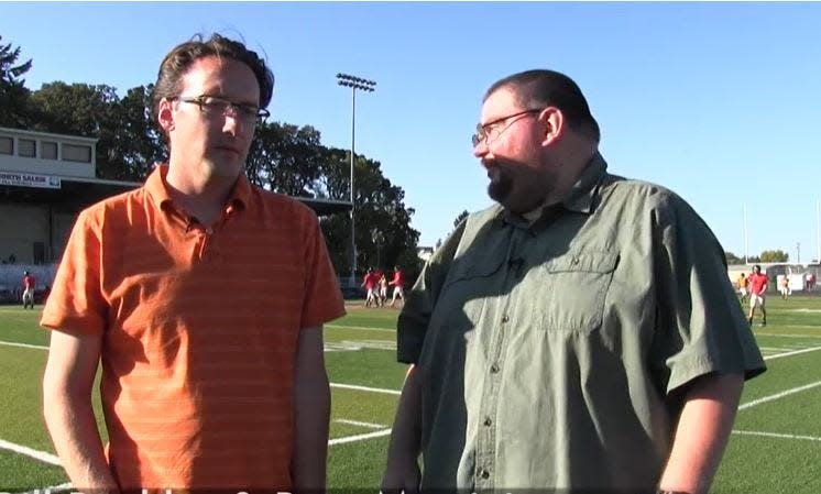 Statesman Journal sports reporter Pete Martini, right, talks with colleague Bill Poehler in 2016 for a video on the performance of Salem-Keizer Public Schools' football teams.