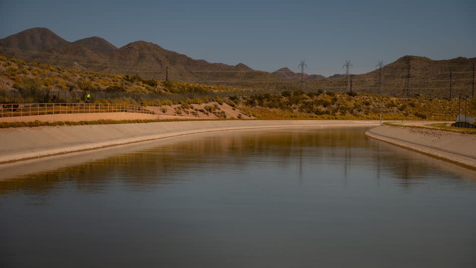 The Central Arizona Project canal curves along Horizon Park in Scottsdale, Arizona, in April. - Will Lanzoni/CNN