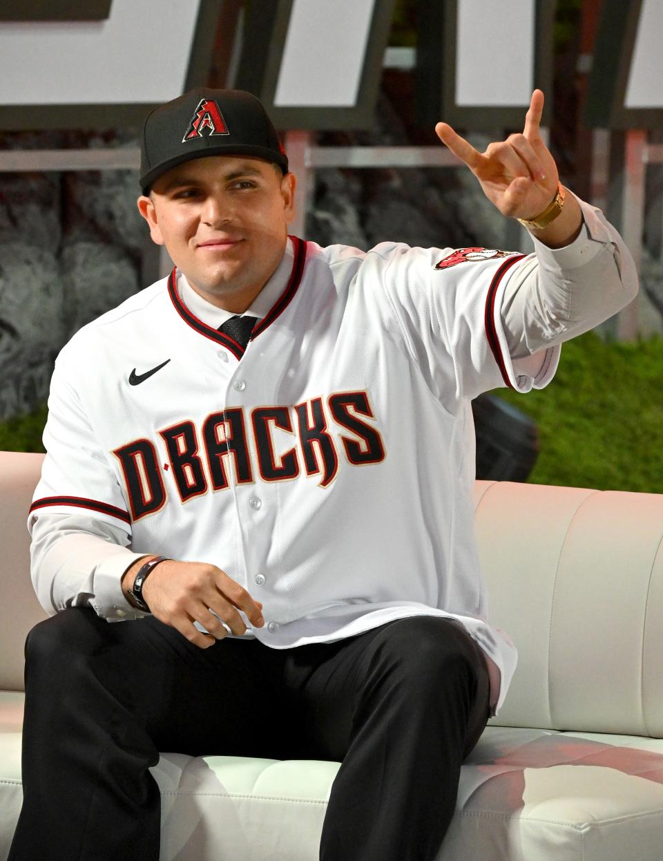 Ivan Melendez wears his jersey after he was selected by the Arizona Diamondbacks as the 43rd pick of the MLB draft at XBox Plaza at LA Live in Los Angeles on July 17, 2022.