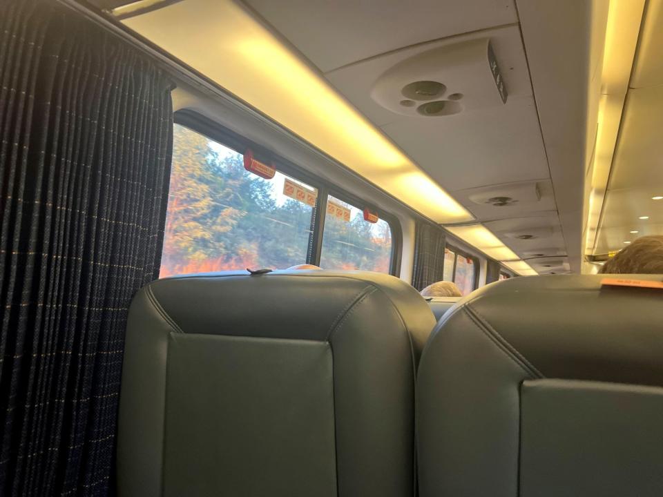 View of the Acela seats and curtain from the author's seat.
