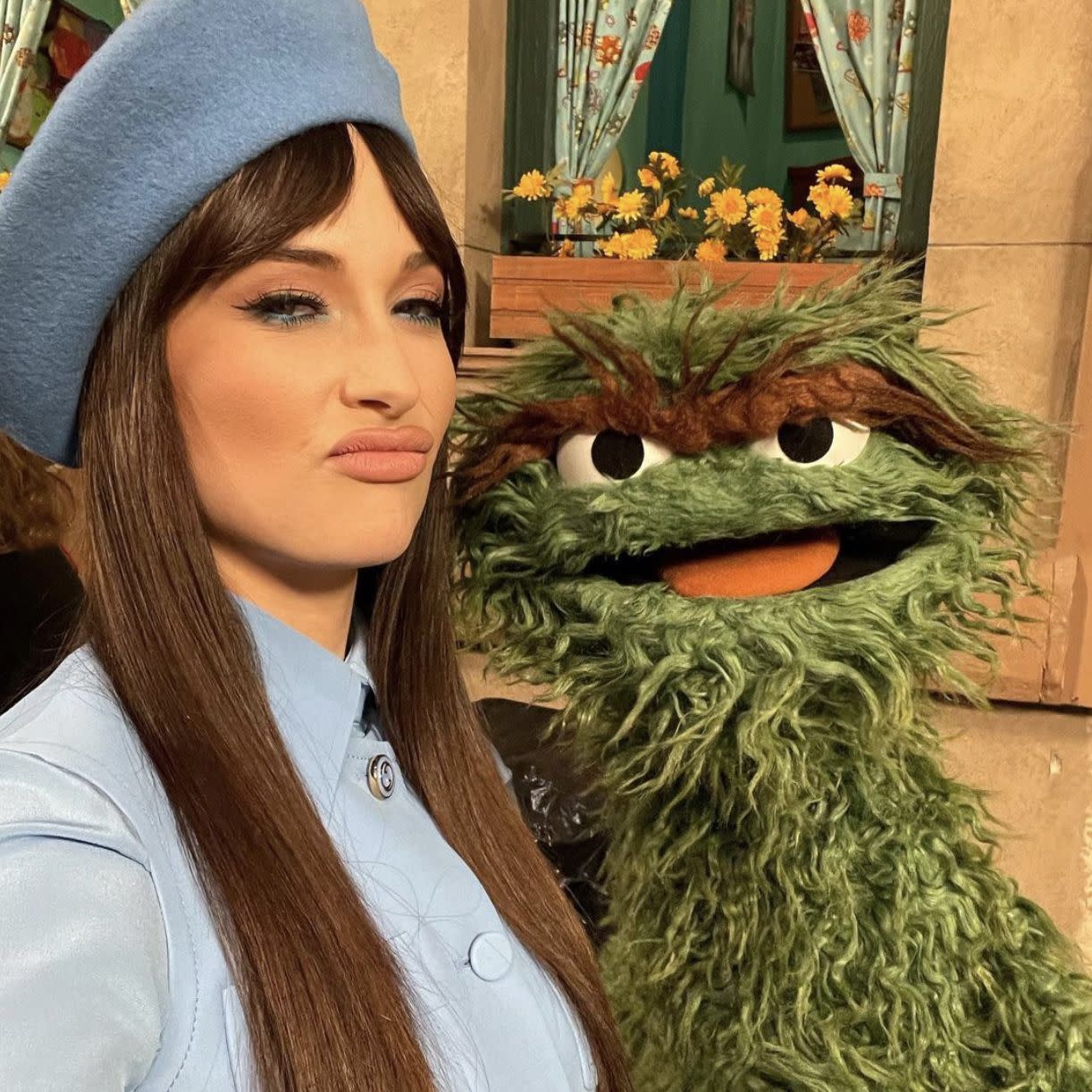 "Rainbow" singer Kacey Musgraves snapped a selfie with Oscar the Grouch while on set of "Sesame Street" on Wednesday, Dec. 16, 2020. "SEE YOU ON THE STREET! @sesamestreet @elmo #Season52"