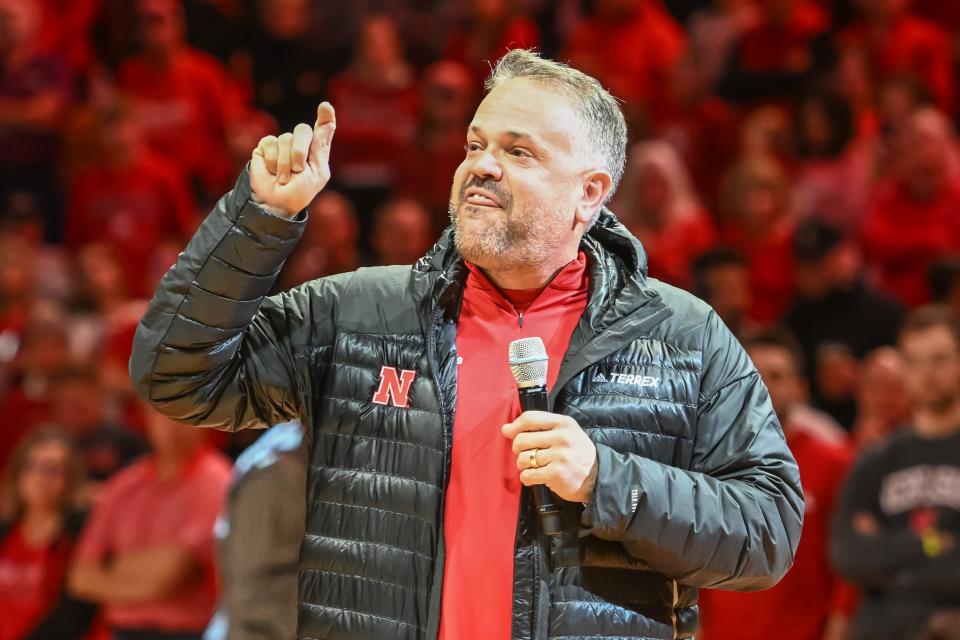 Nebraska football coach Matt Rhule talks to the crowd during halftime of the the school's men's basketball game against Purdue at Pinnacle Bank Arena.