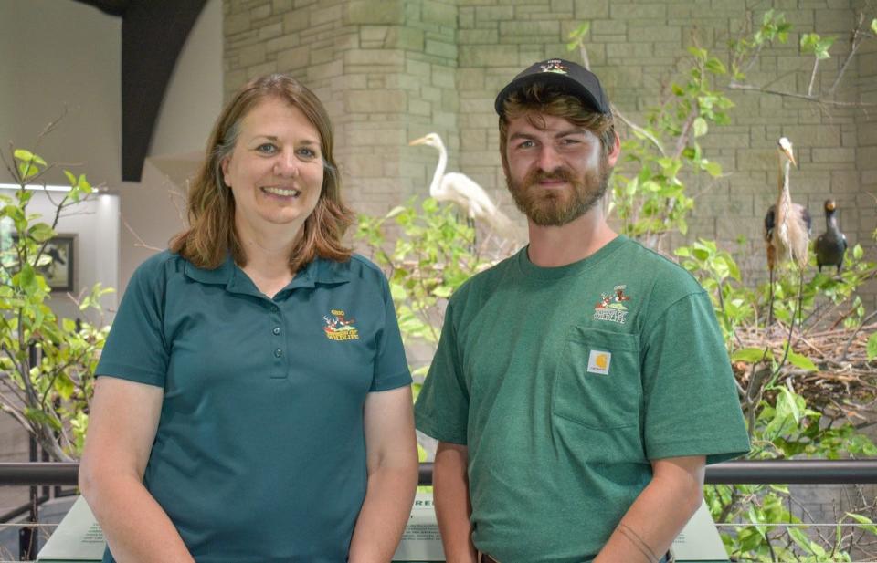 ODNR Wildlife Communication Specialist, Kelly Schott, left, and Natural Resources Technician Neil Baker stand on the second floor of the Magee Marsh Visitor Center. Prior to the renovation, the upstairs was inaccessible to the public.