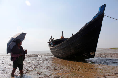 A stranded boat which was used by Rohingya Muslims is seen at the Thande village beach outside Yangon, Myanmar November 16, 2018. REUTERS/Myat Thu Kyaw