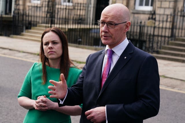 Kate Forbes looks on as First Minister speaks outside Bute House, Edinburgh