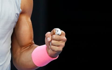 Nadal fist pumps after winning a point - Credit: Reuters