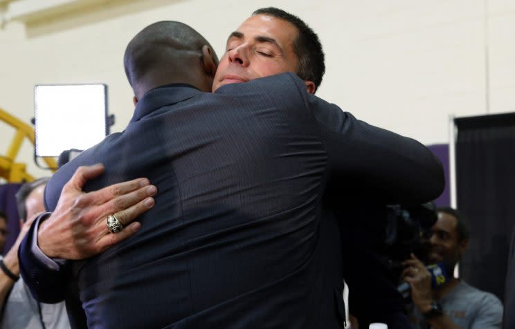 Rob Pelinka hugs Kobe Bryant, the most accomplished friend in the world. (AP)