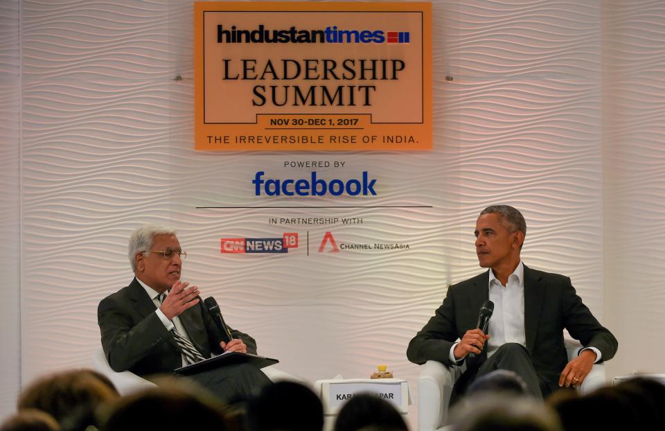 Former President America Barack Obama with Indian journalist Karan Thapar at the Hindustan Times Leadership Summit in New Delhi on Dec. 1. (Photo: Money Sharma/AFP/Getty Images)