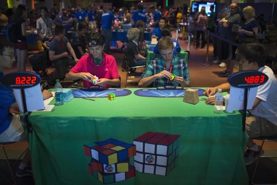 Participants compete at the National Rubik's Cube Championship at Liberty Science Center in Jersey City, New Jersey