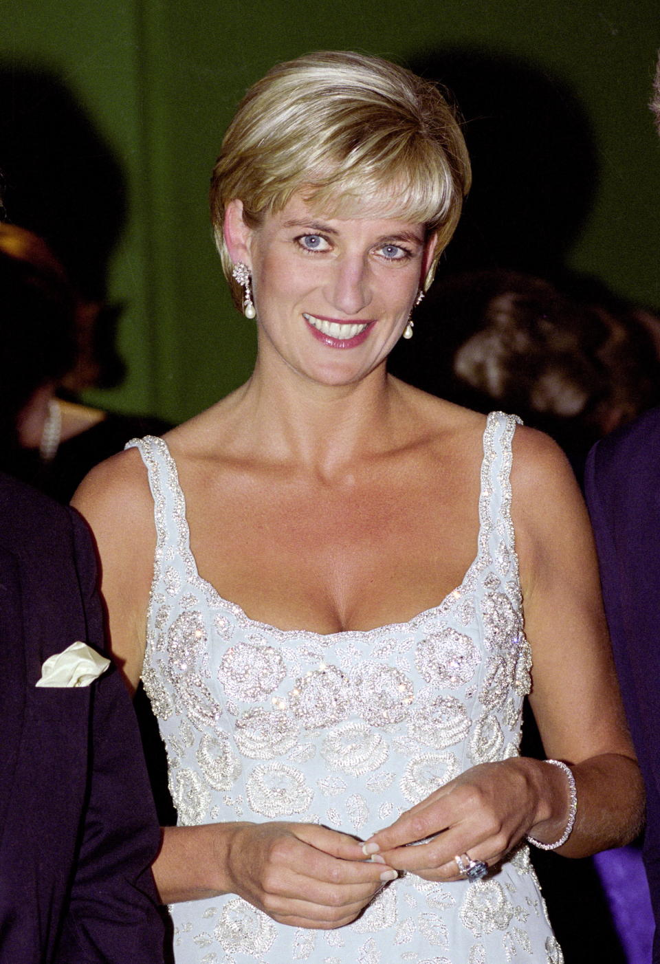 LONDON, UNITED KINGDOM - JUNE 02:  Diana, Princess Of Wales Wearing An Embroidered Cocktail Dress Designed By Fashion Designer Catherine Walker At The Private Viewing And Reception At Christies To Raise Funds For The Aids Crisis Trust And The Royal Marsden Hospital Cancer Fund.  (Photo by Tim Graham Photo Library via Getty Images)