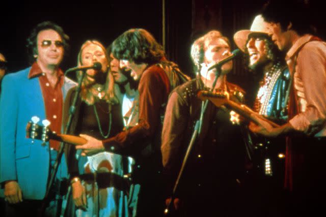 <p>Moviestore/Shutterstock </p> Neil Diamond, Joni Mitchell, Neil Young, Rick Danko, Van Morrison, Bob Dylan and Robbie Robertson in 'The Last Waltz'