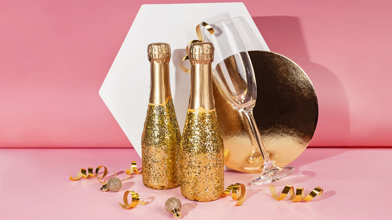 mini champagne bottles with decorations