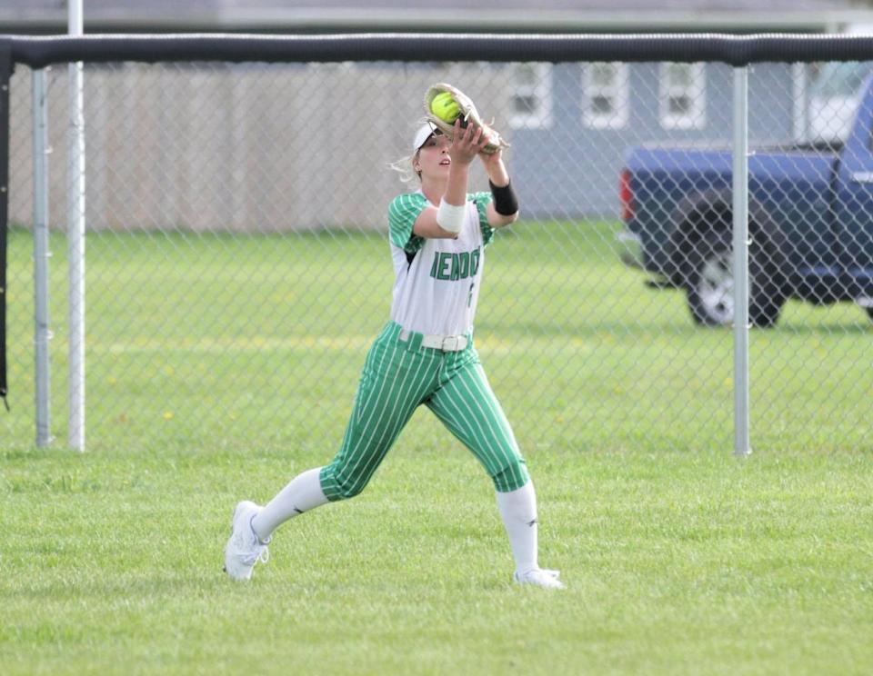 Mendon centerfielder Taya Bingaman runs down a fly ball for an out on Wednesday.