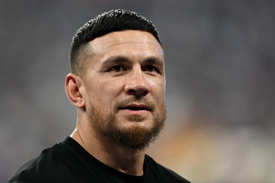 Sonny Bill Williams looks on.