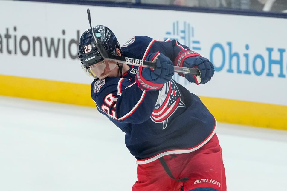 Oct 25, 2022; Columbus, Ohio, USA;  Columbus Blue Jackets left wing Patrik Laine (29) shoots during warm-ups prior to the NHL hockey game against the Arizona Coyotes at Nationwide Arena. Mandatory Credit: Adam Cairns-The Columbus Dispatch