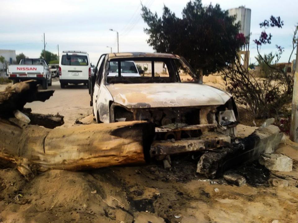 <p>A damaged car at the site of the Egypt Sinai mosque bombing in Al-Arish, Egypt on Nov. 24, 2017. (Photo: Stringer/Anadolu Agency/Getty Images) </p>