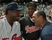 FILE PHOTO: Former New York Yankee great Reggie Jackson (R) shares a laugh with former Philadelphia Phillies Dick Allen (L) and former Baltimore Oriole Frank Robinson before an old timers game at Camden Yards July 12, 1993. Reuters/Mike Theiler/File Photo