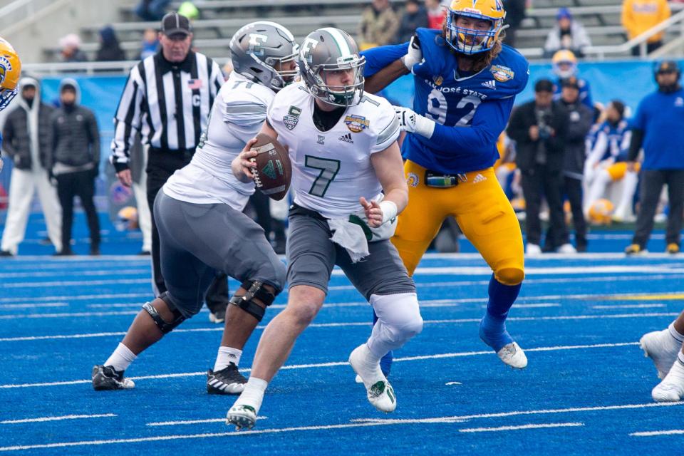 Eastern Michigan Eagles quarterback Taylor Powell (7) looks for an open area during the first half of action of the Famous Idaho Potato Bowl against the San Jose State Spartans at Albertsons Stadium.