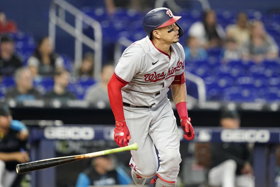 Washington Nationals' Joey Meneses watches after hitting a two run home run during the first inning of a baseball game against the Miami Marlins, Sunday, Sept. 25, 2022, in Miami.(AP Photo/Lynne Sladky)