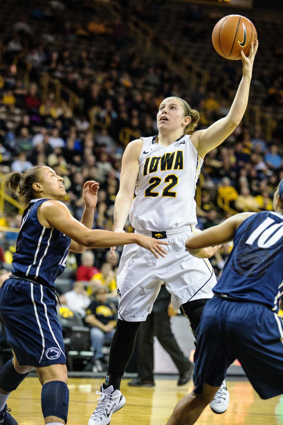 Iowa's Sam Logic (22) puts up a layup against Penn State during the second half of play at Carver-Hawkeye Arena in Iowa City on Sunday, Dec. 28, 2014.