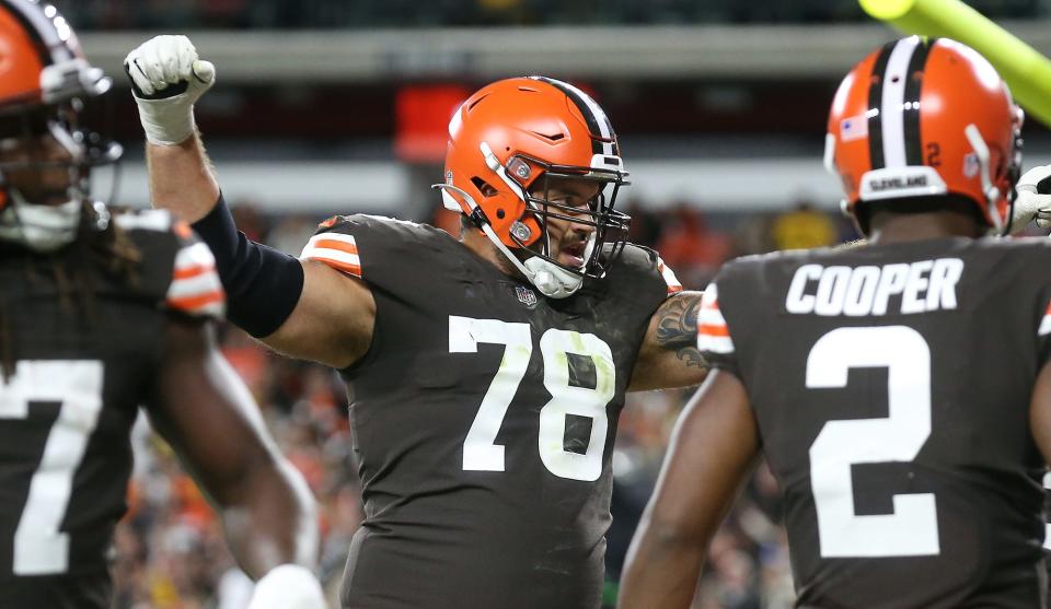 Browns offensive tackle Jack Conklin celebrates a David Njoku first-half touchdown against the Steelers, Thursday, Sept. 22, 2022, in Cleveland.