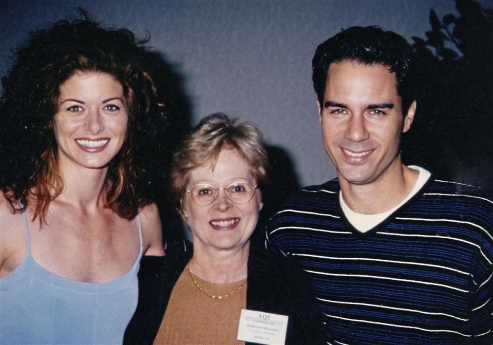 Deborah Messing, Dorothy Swanson, and Eric McCormack smiling for the camera at a VQT event.
