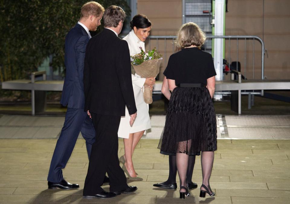The Duchess carried her flowers inside the museum.
