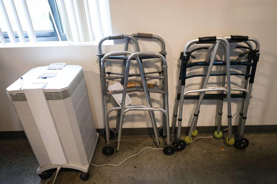 An air cleaner and walkers in one of the dorms at 40 Prado homeless services center in San Luis Obispo.