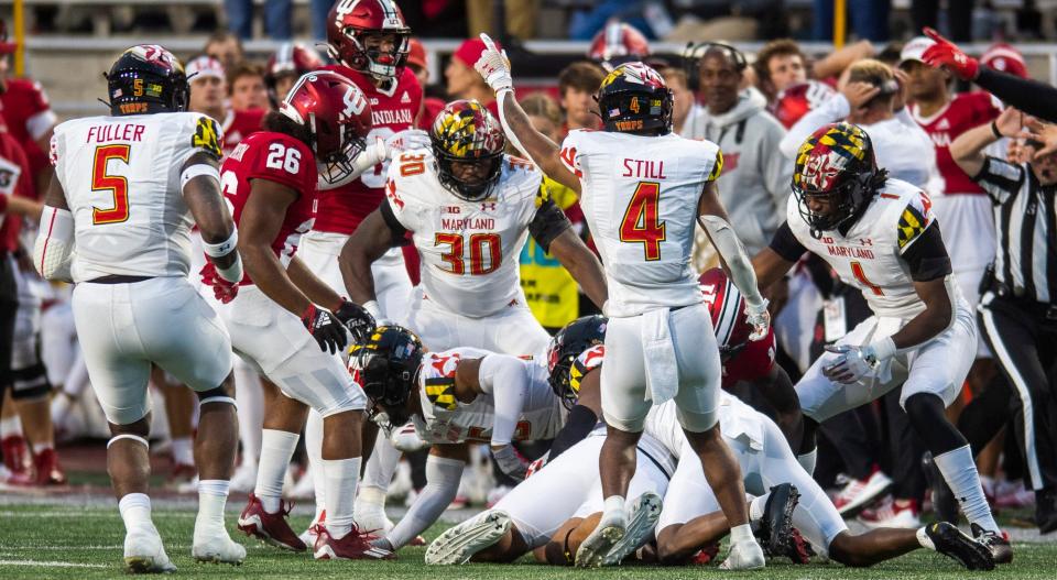 Maryland celebrates their fumlbe recovery during the Indiana versus Maryland football game at Memorial Stadium on Saturday, Oct. 15, 2022.