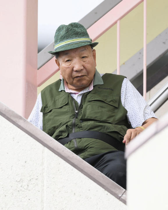 Iwao Hakamada, 88, leaves home for his daily stroll in Hamamatsu, central Japan on 26 September 2024. (PHOTO: Kyodo/via REUTERS)