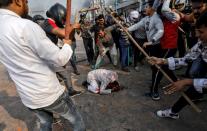 A Picture and its Story: A mob out for blood: India's protests pit Hindus against Muslims